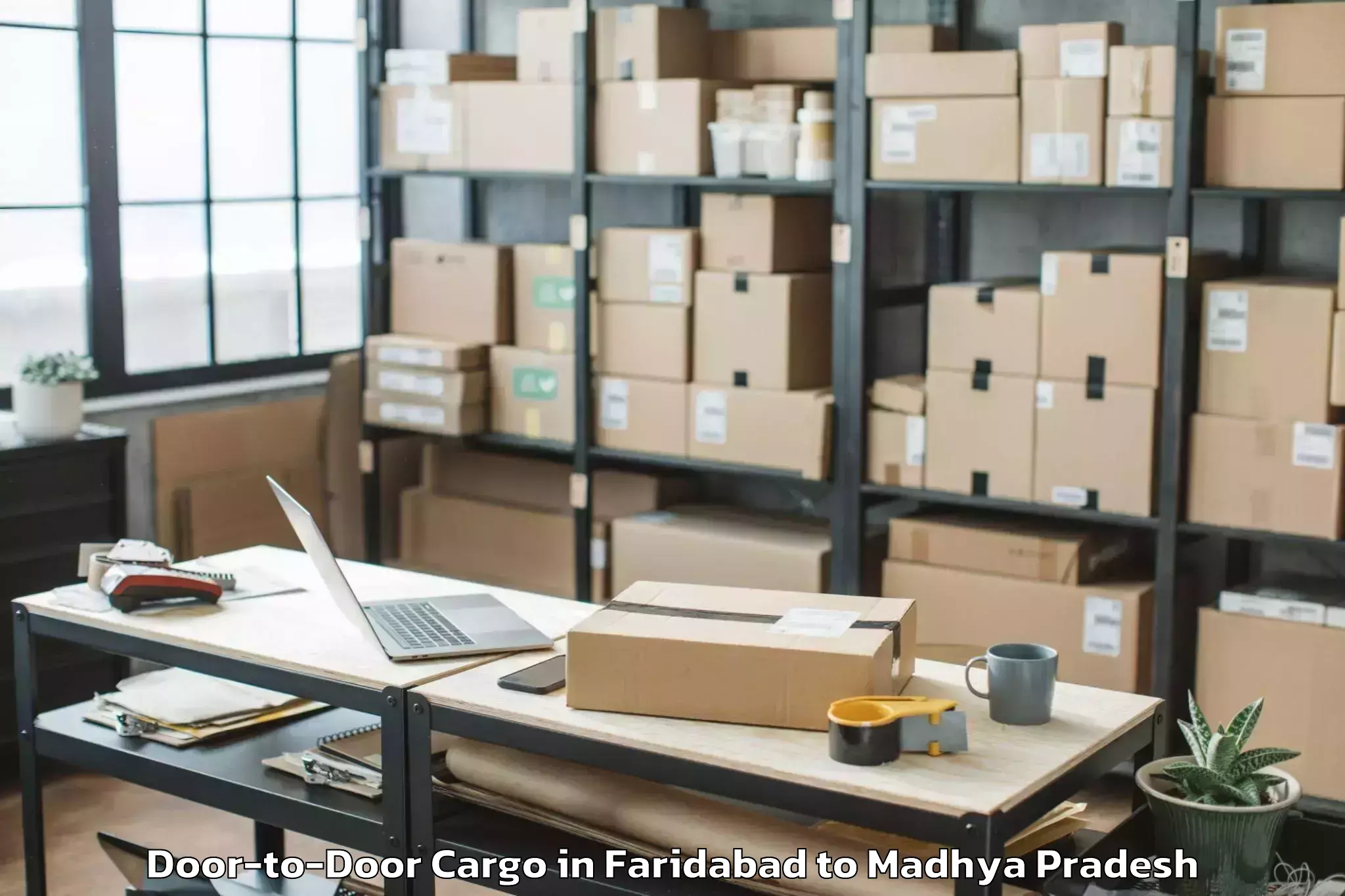 Hassle-Free Faridabad to Bhanpura Door To Door Cargo